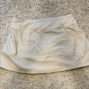 Like New! Lululemon size 10 cream skirt